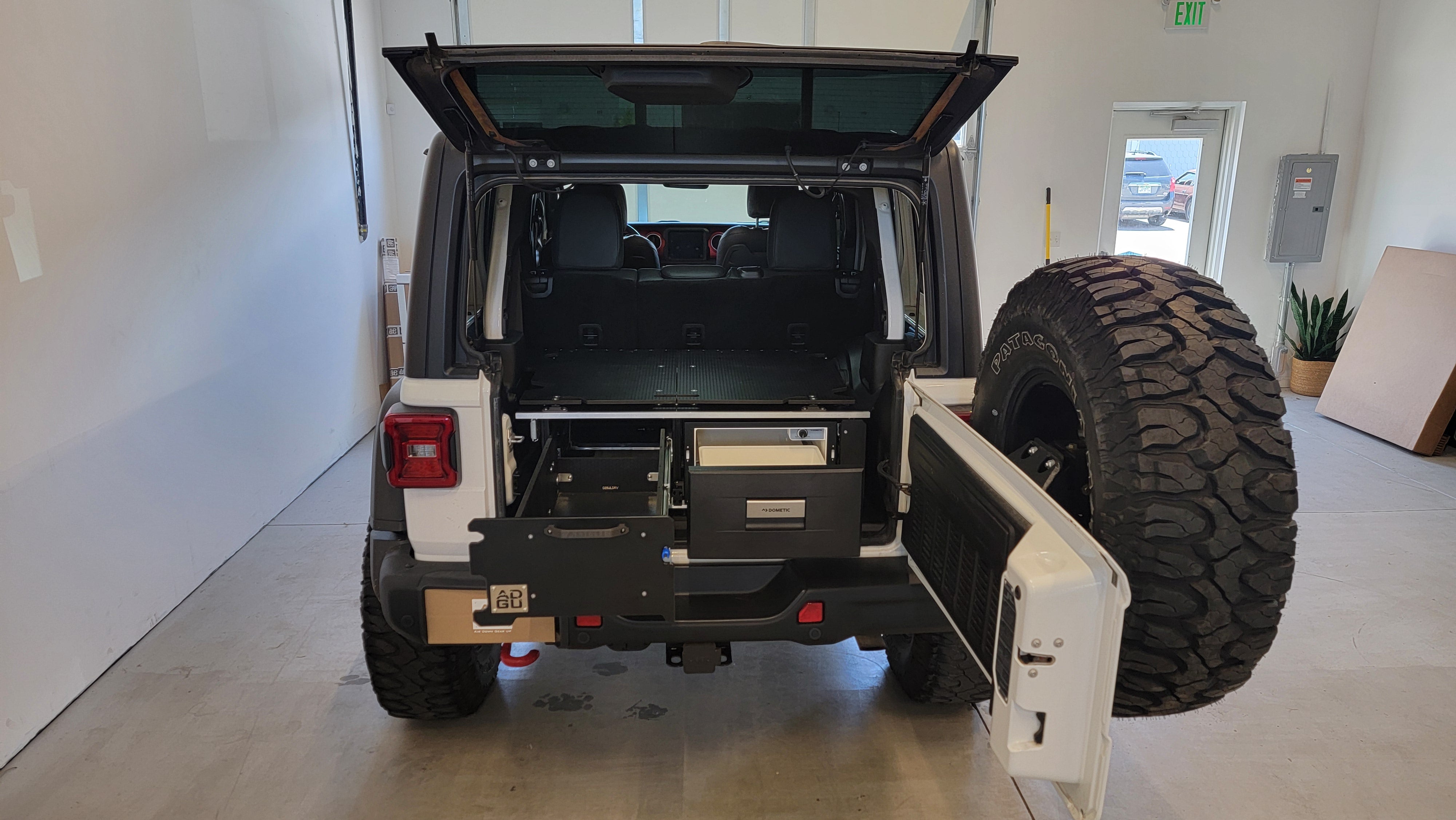 Jeep Wrangler Rubicon JLU storage drawers, fridge and sleeping platform for  overland adventure modification