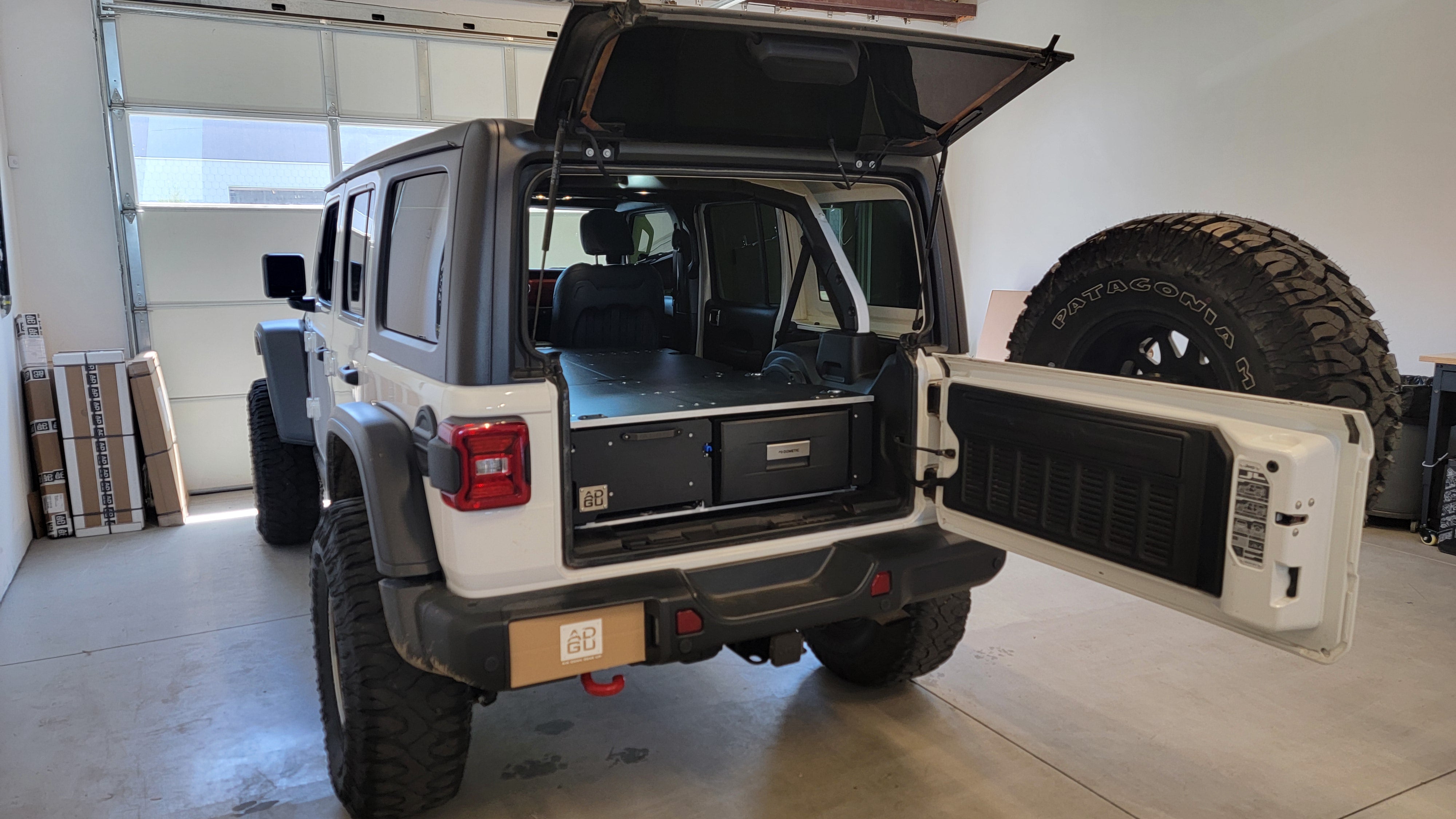 Jeep Wrangler Rubicon JLU storage drawers, fridge and sleeping platform for  overland adventure modification