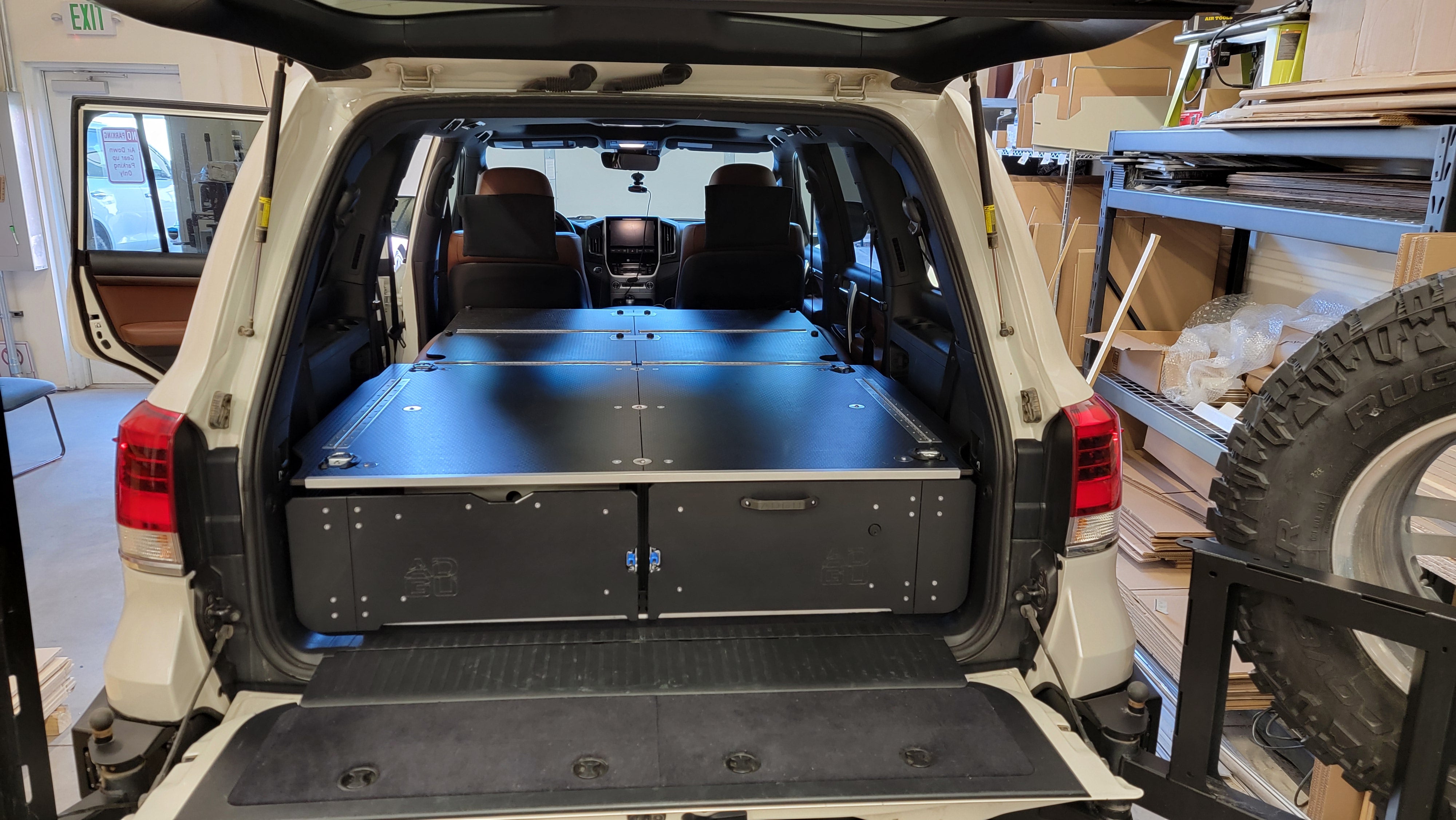 200 Series Toyota Land Cruiser LX570 drawer system with sleeping platform for vehicle organization perfect for overland travel.