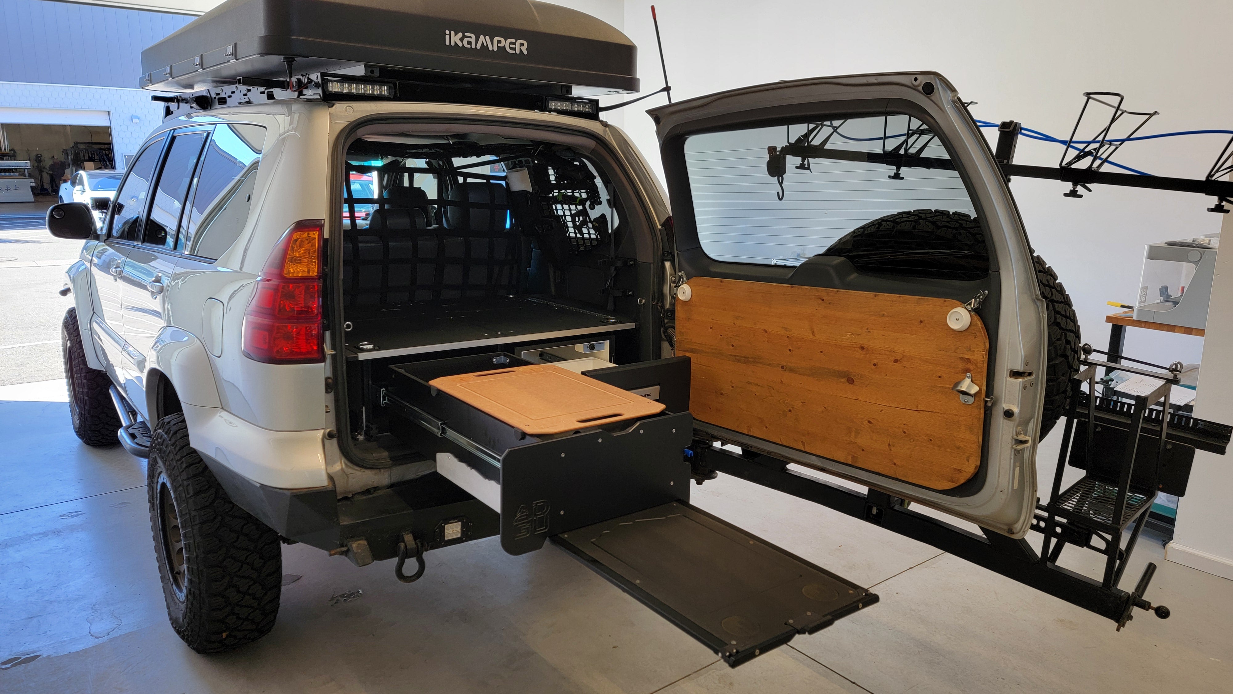GX470 drawer storage  system with  fridge and sleeping platform for vehicle organization