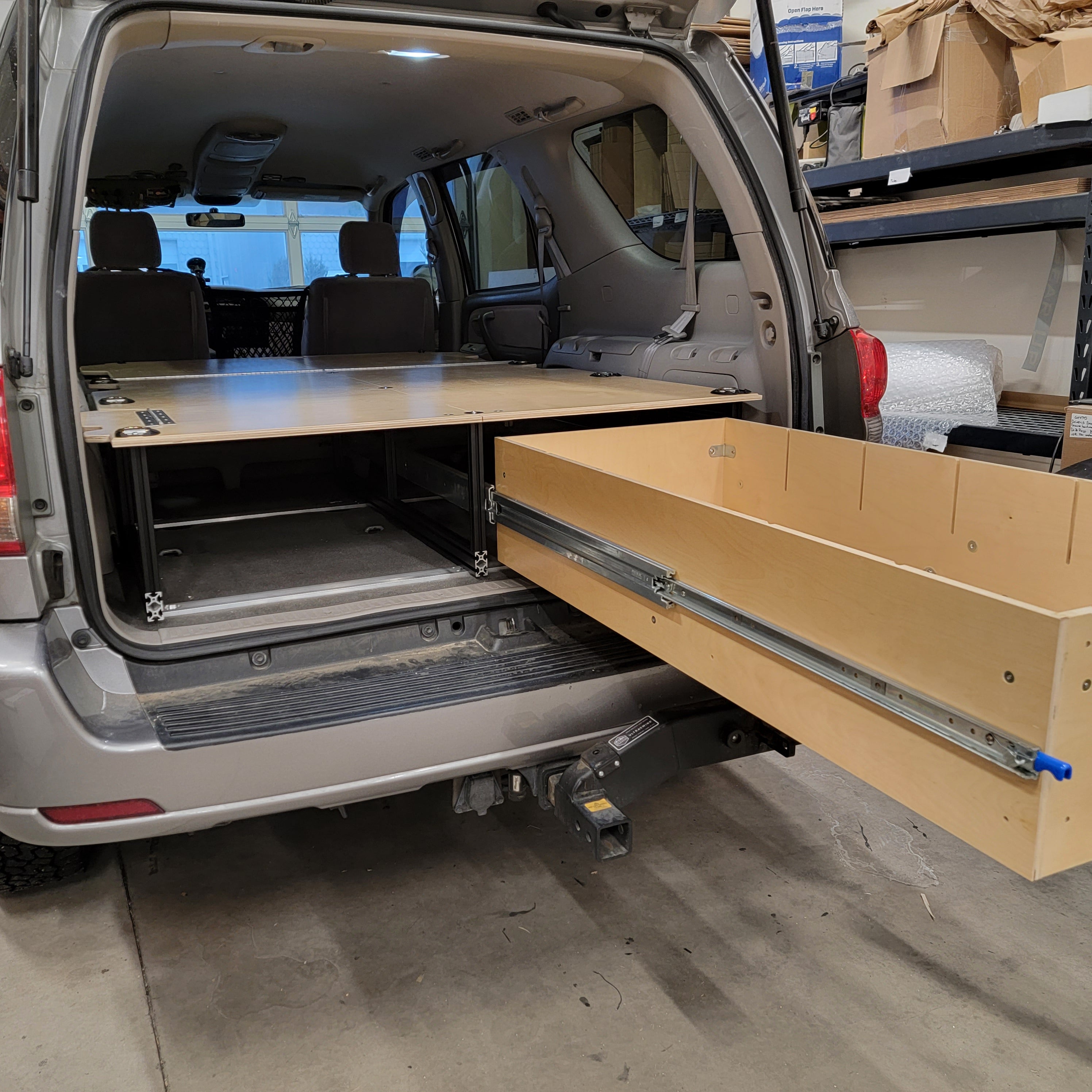 Toyota Sequoia drawer system with sleeping platform for vehicle organization
